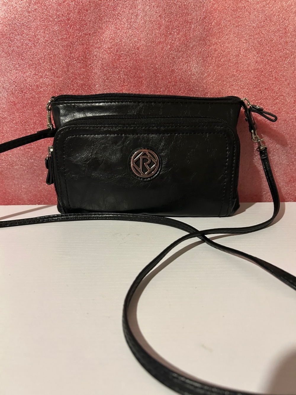 Relic Black Crossbody with Silver Logo